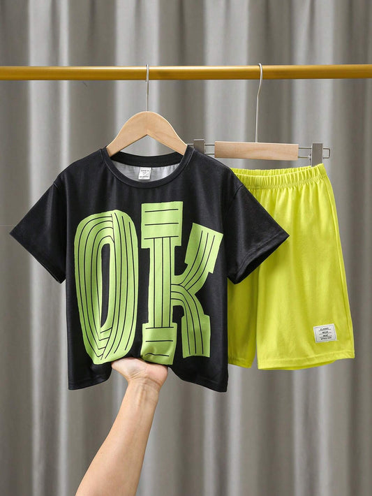 2pcs Street Style Loose Fit Round Neck T-Shirt With Big Letters And Elastic Waistband Decorative Bright Shorts Suit